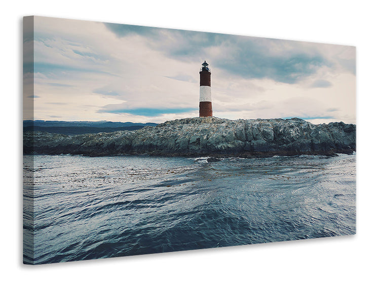 Vászonképek The lighthouse by the sea