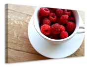 Vászonképek A cup of raspberries